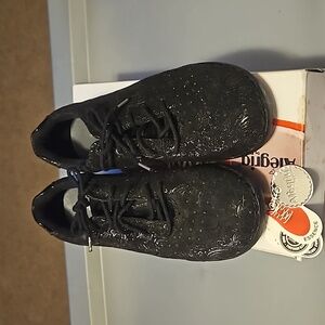 Alegria black textured sneakers